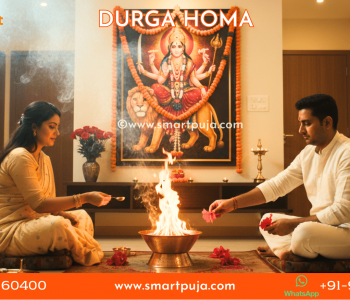 Vedic Pandits performing Durga Homa with offerings into the sacred fire to remove negativity.