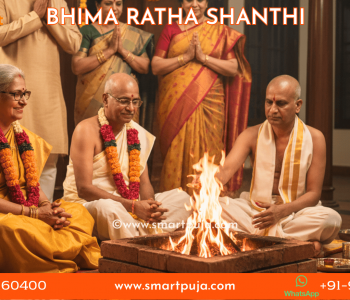 An elderly couple performing Bhima Ratha Shanthi rituals with a Pandit.