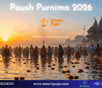 Devotees taking a holy dip in the Ganga River during sunrise on Paush Purnima 2026