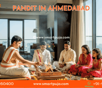 Traditional Gujarati Gor Maharaj performing Vastu Puja in an Ahmedabad home.
