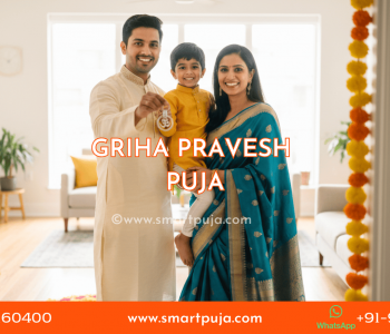 A happy Indian family holding house keys after completing the Griha Pravesh Puja.