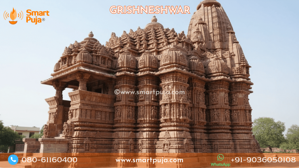 The highly detailed red volcanic stone carvings of the Grishneshwar Jyotirlinga temple near Ellora.