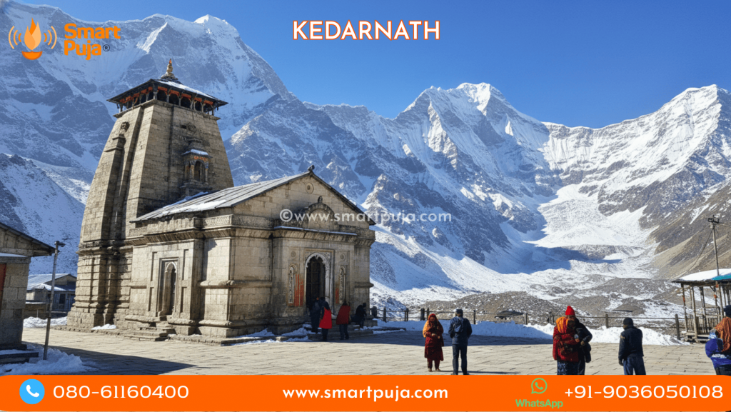 The ancient Kedarnath Jyotirlinga temple built from massive grey stone slabs in the snow-capped Himalayas.